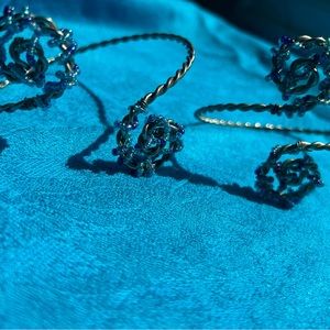 TWO UPPER ARM BEADED BRACELETS